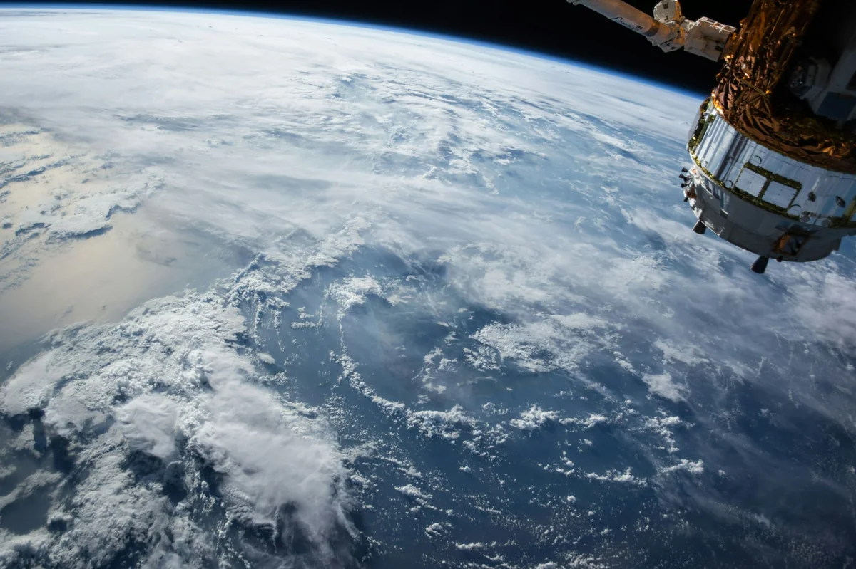 Earth viewed from space, illustrating the contrast between light and darkness